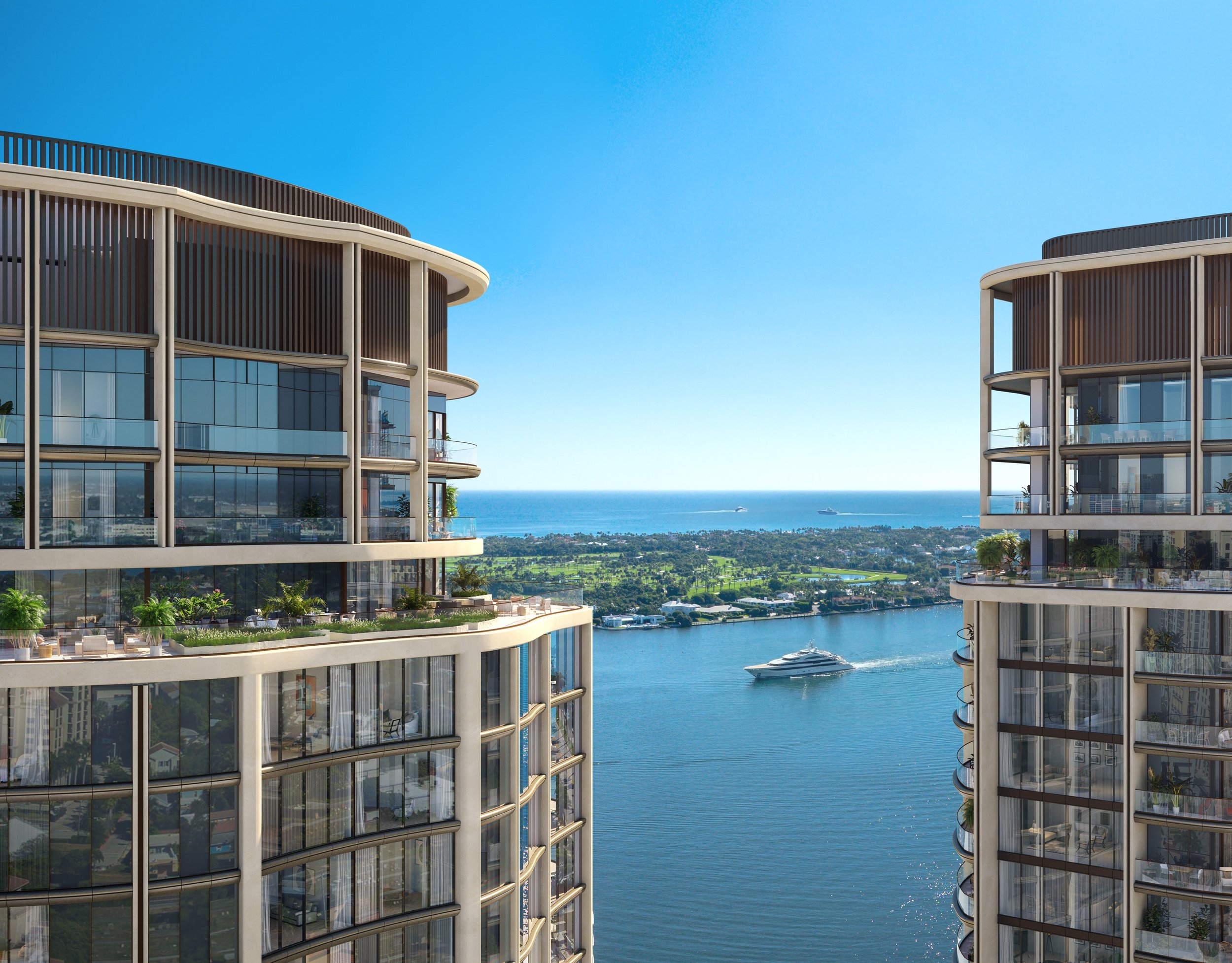 View between the two curved towers at Edgeworth West Palm Beach showing Intracoastal Waterway and yacht