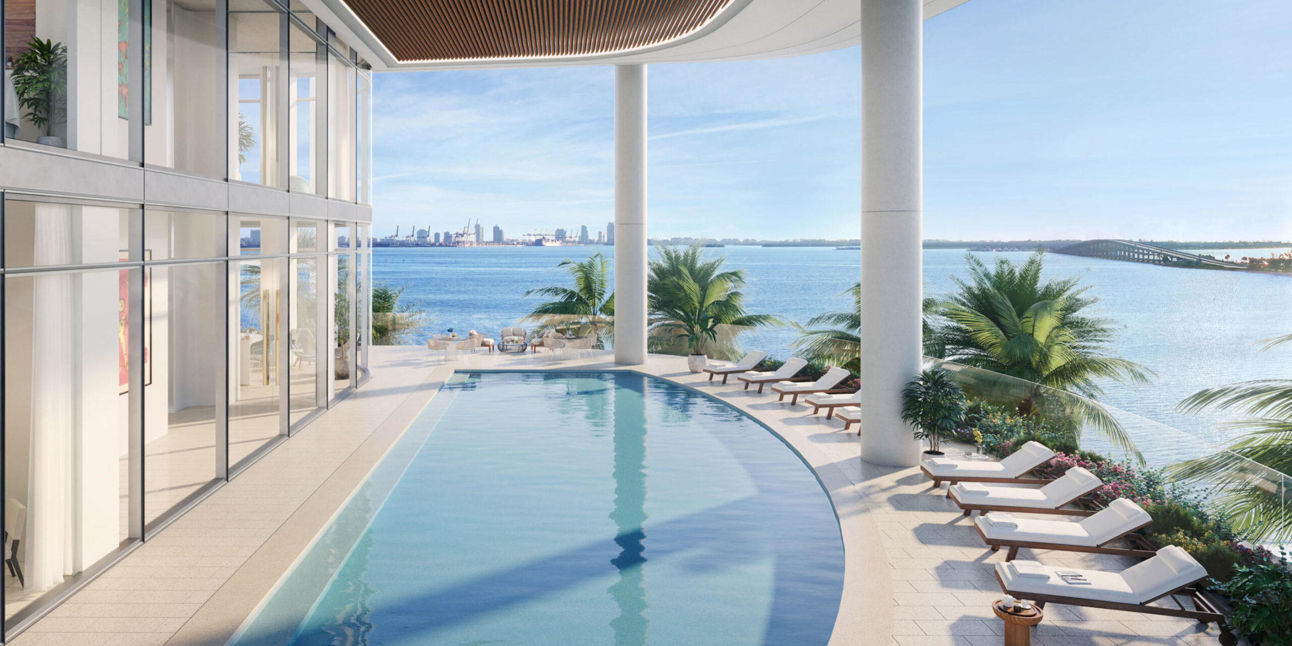 Una Residences Brickell third-floor pool deck with Biscayne Bay views